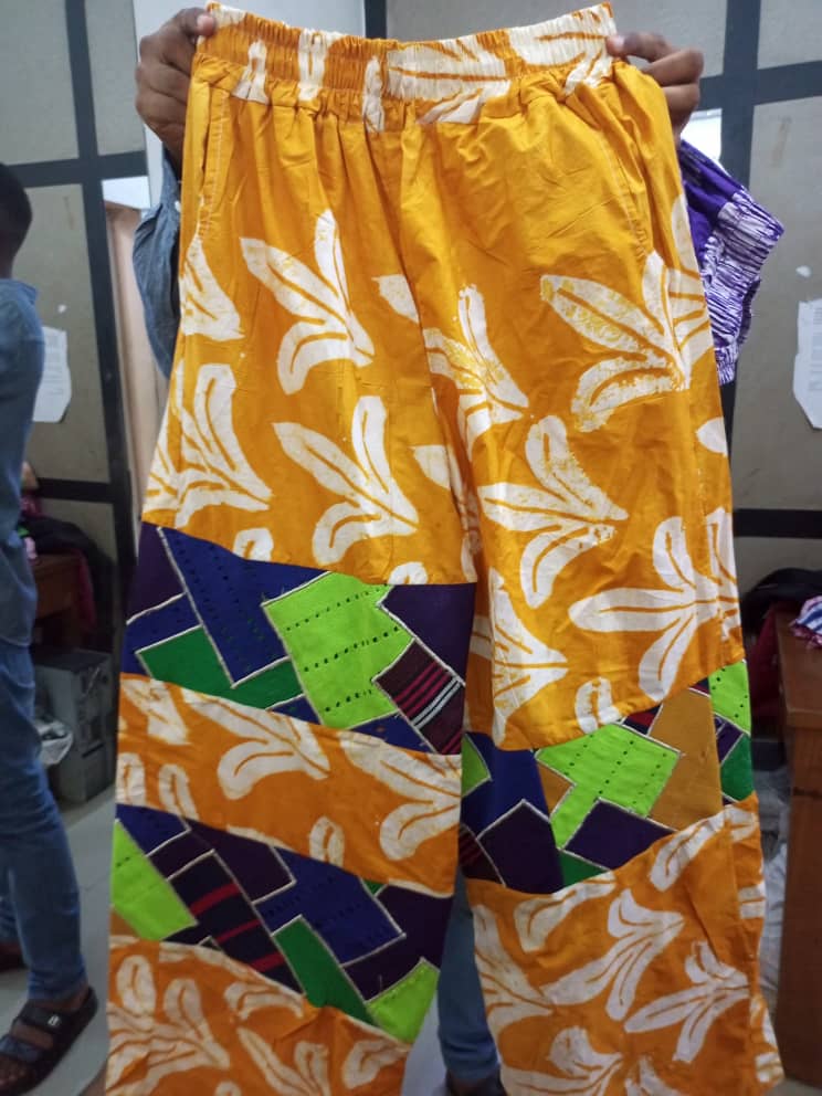 Adire trousers with patches aso-oke